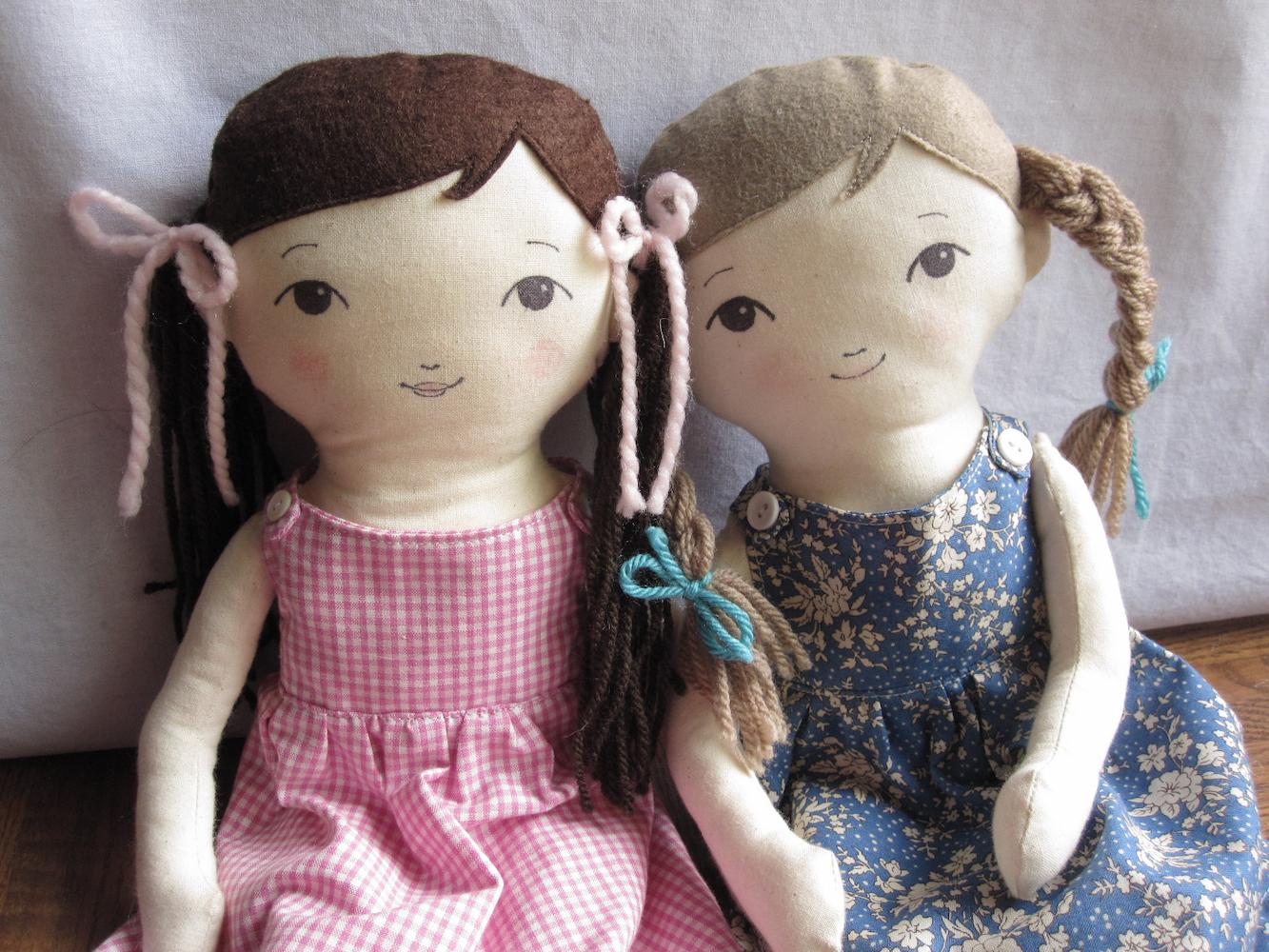 closeup of 18 inch rag dolls with dress