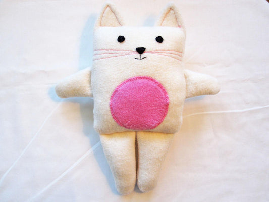 front of little cat doll