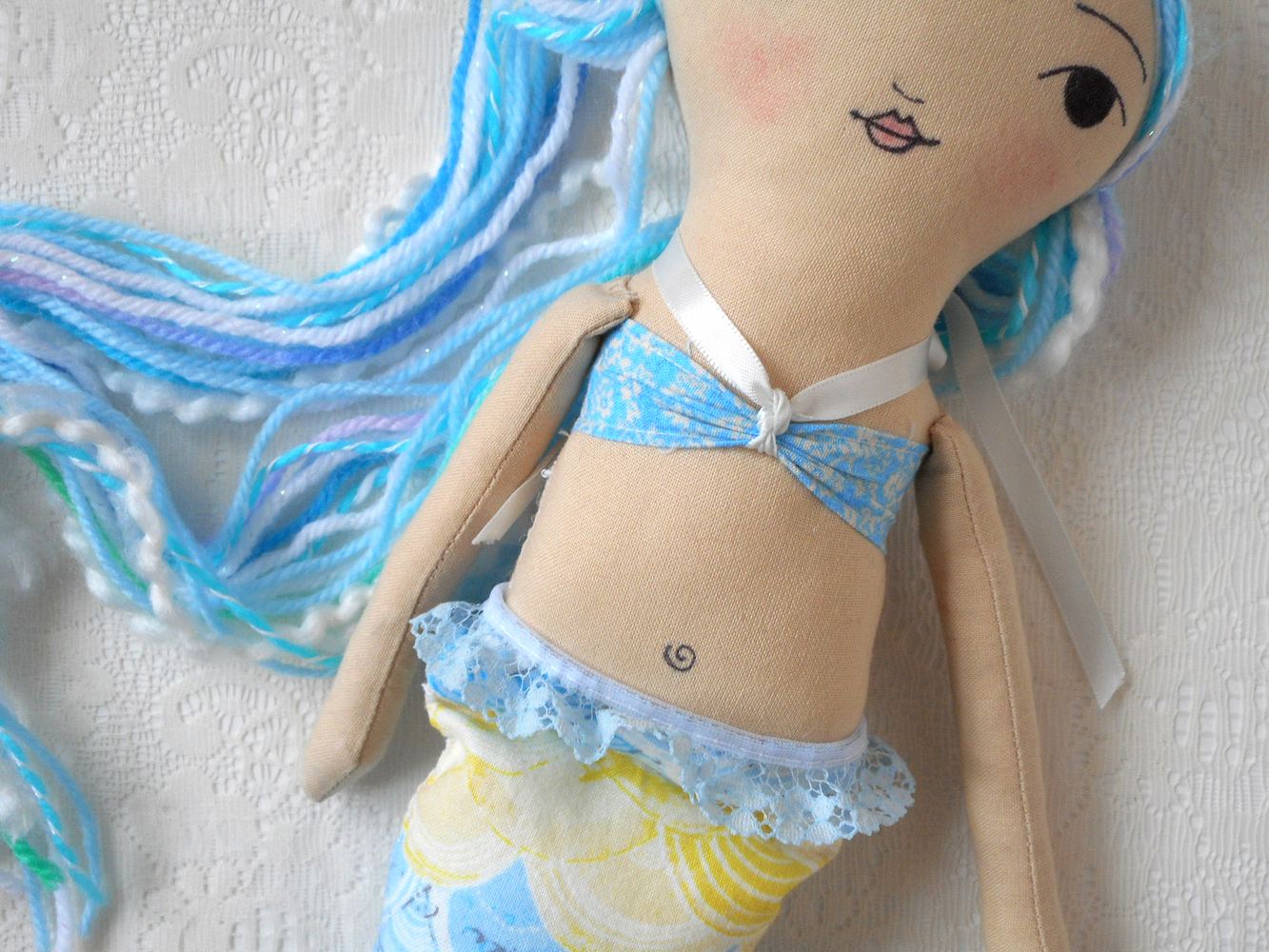 closeup of mermaid doll pattern