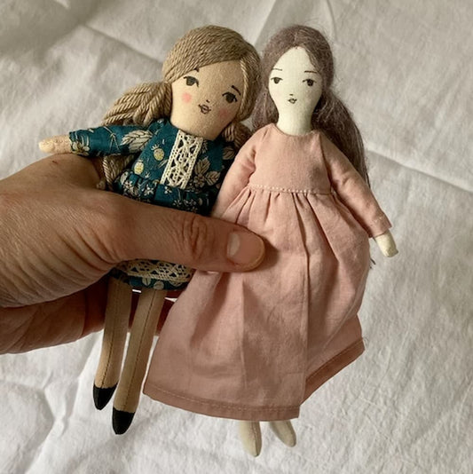 sew two mini dolls with this sewing pattern bundle